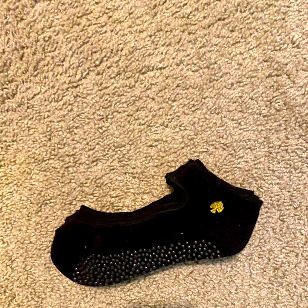 KATE SPADE pure bare socks with grippy feet. Never been used two pairs